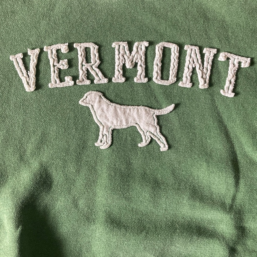 Green hoodie with vermont and a dog
